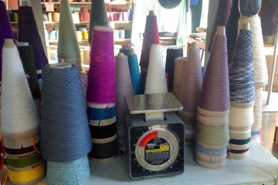 yarn cones waiting to be weighed
